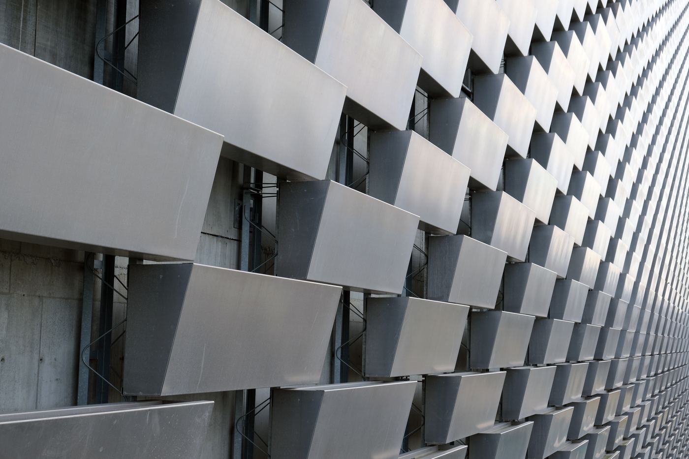 Amager Bakke, Copenhagen's waste-to-energy plant, a sloped building with a stack, in 2023